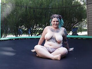 Fat Tattooed Milf Jumping And Stripping On A Trampoline free video